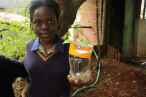 people learning to grow food