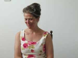 picture of woman looking a bit embarrassed