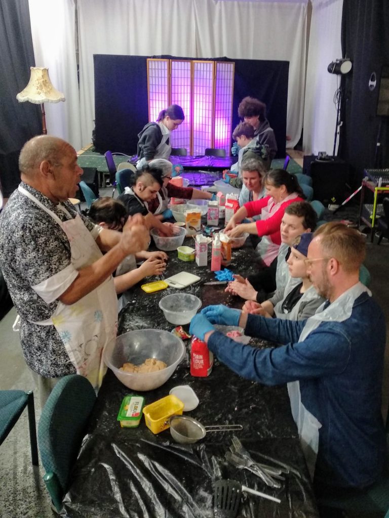Albert and Kamura making biscuits - food has always been a big part of Friction celebrations