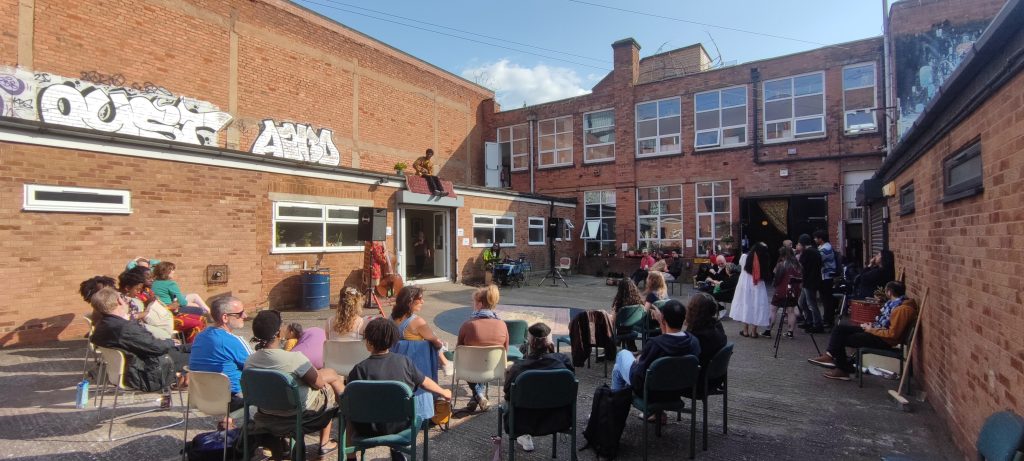 Xhosa Cole performing at the Edge